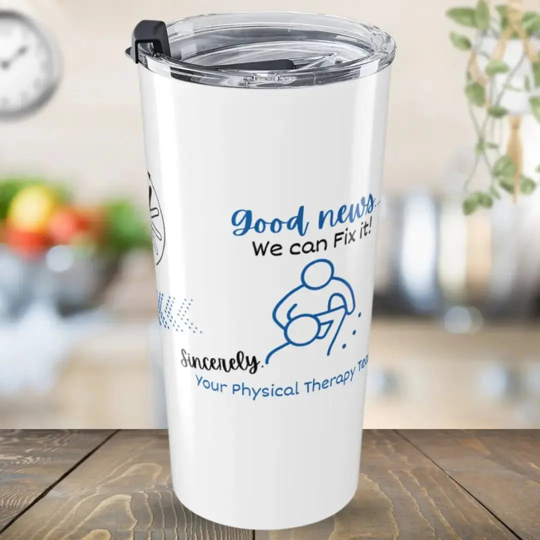 White tumbler with blue text 'Good News we can fix it your physical therapy team' and graphics on a wooden surface
