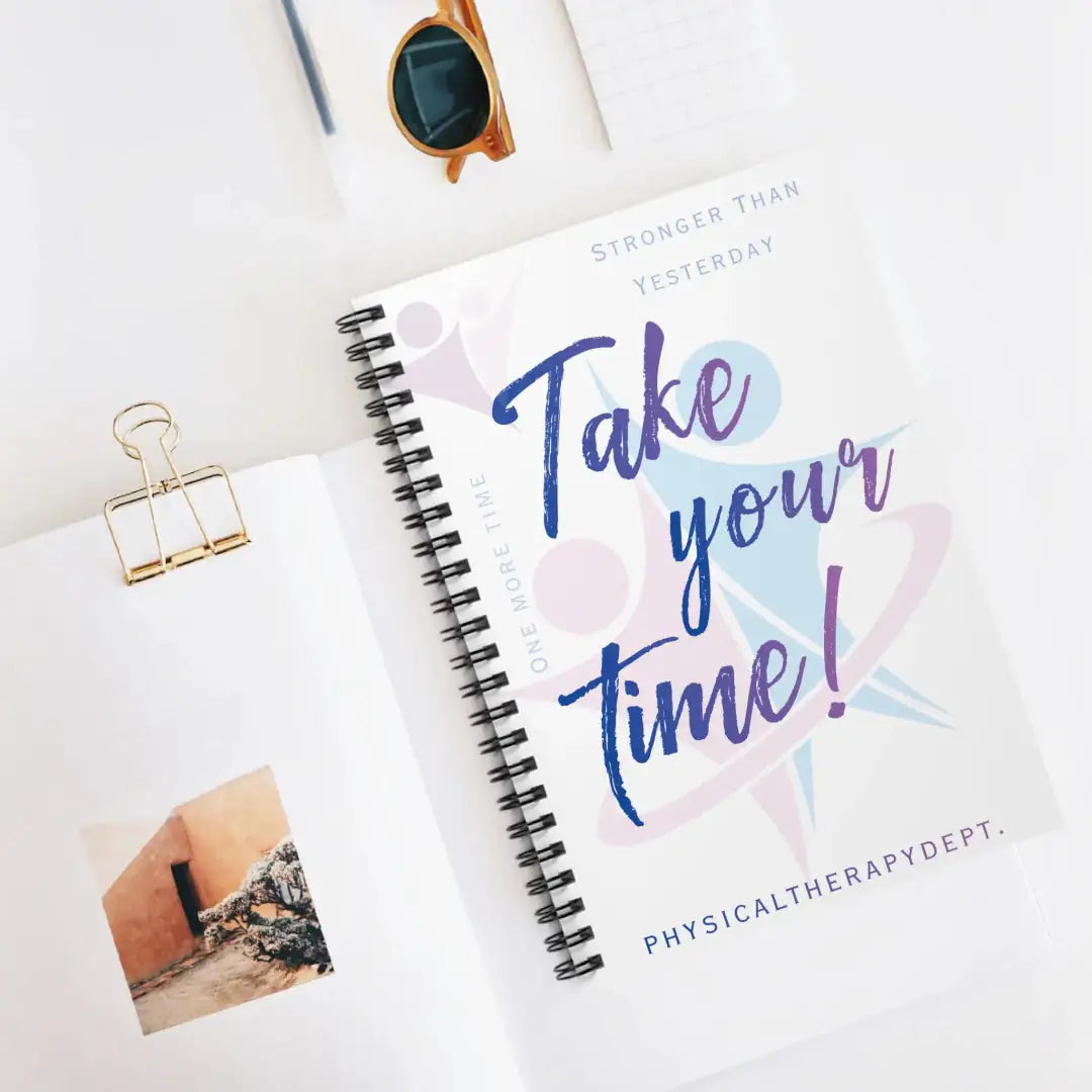 Notebook with 'Take your time physical therapy dept.' logo on a white surface
