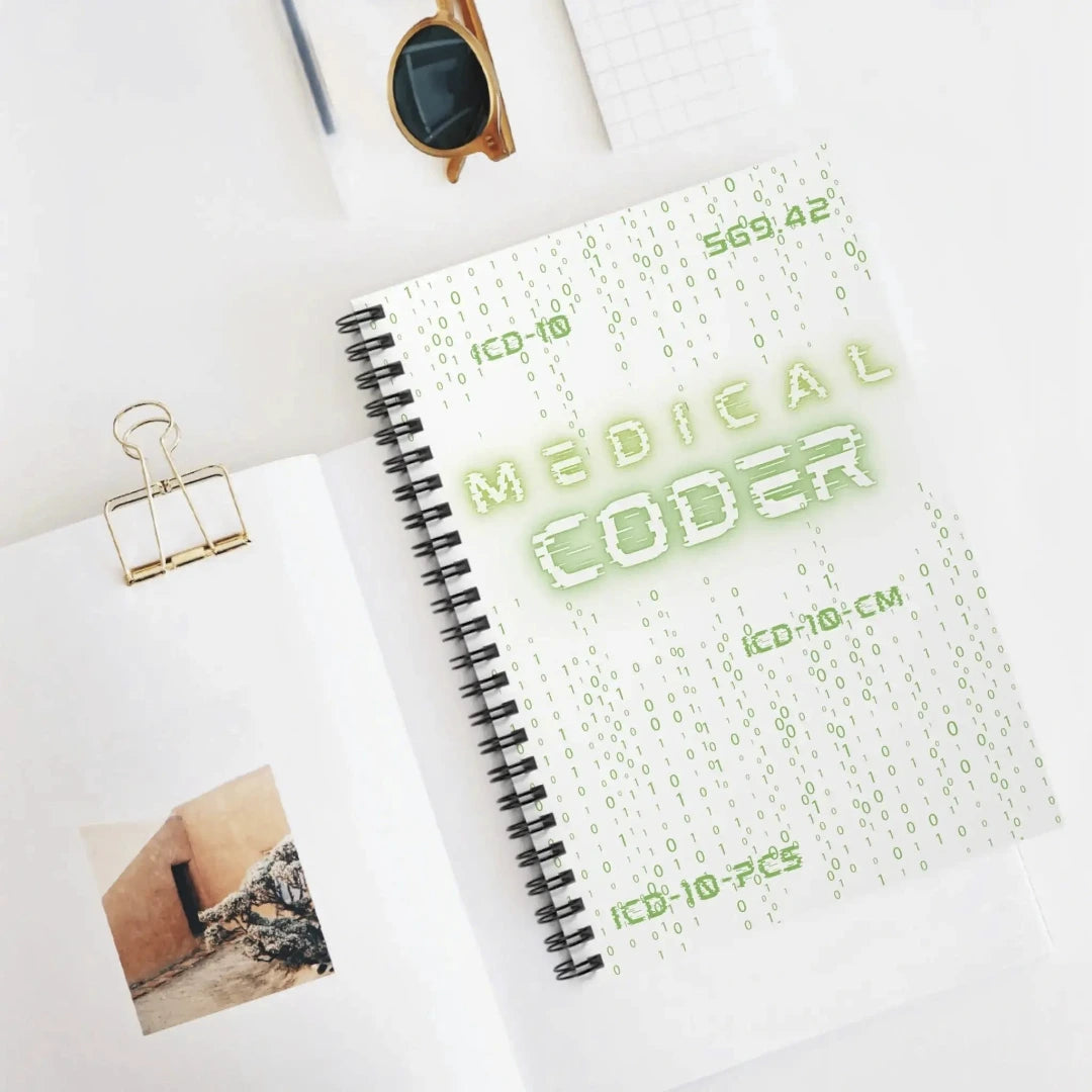 Medical Coder Notebook Matrix coding design on a white desk