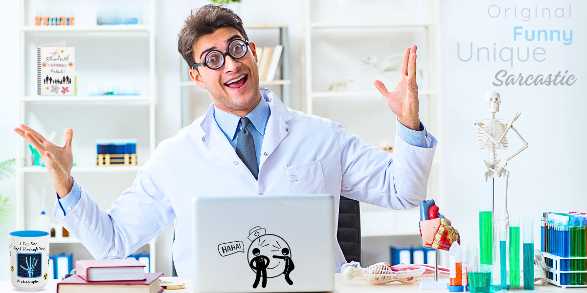 Doctor laughing at his desk with medical items on the desk.