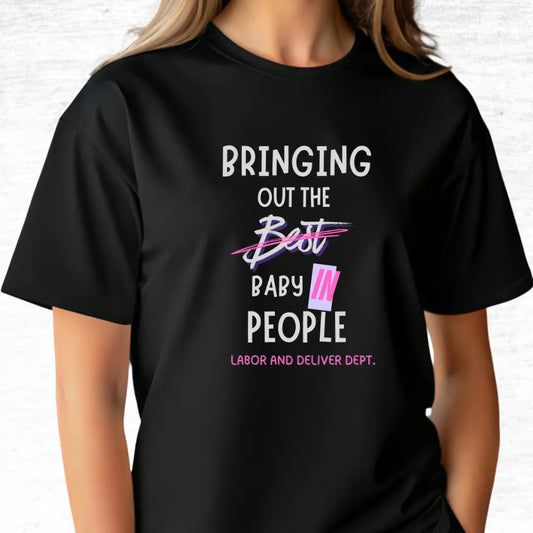 Black labor and delivery t-shirt with humorous 'Bringing out the baby in people' text design on a light gray background