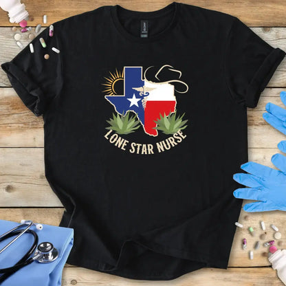 Black med t-shirt with 'Lone Star Nurse' design on a wooden surface with medical supplies.