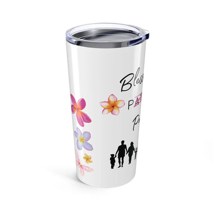 White tumbler with floral designs and people silhouette on a white background