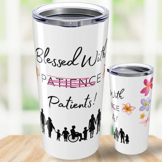 Two tumblers with 'Blessed With Patients' on a wooden surface