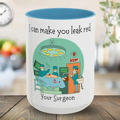Mug with a humorous design of surgeons and text 'I can make you leak red. Your Surgeon' on a blurred background.
