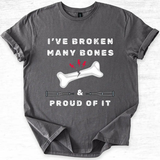 Gray t-shirt with a graphic and text 'I've broken many bones & proud of it' on a light gray background