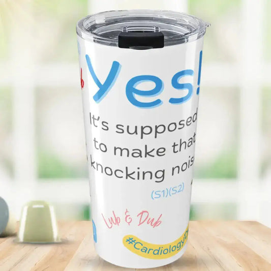 Tumbler with Yes, It's supposed to make that knocking noise' text and colorful design on a wooden surface