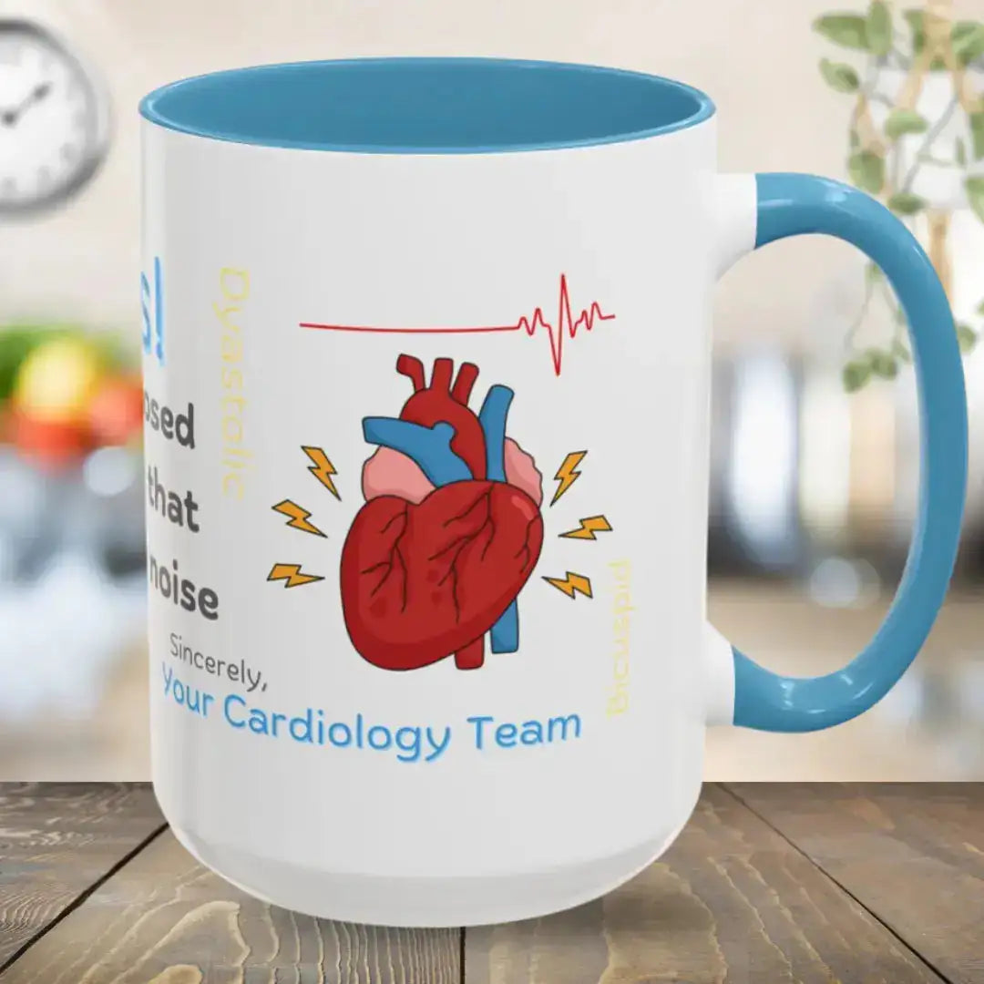Mug with heart design and text on a wooden surface