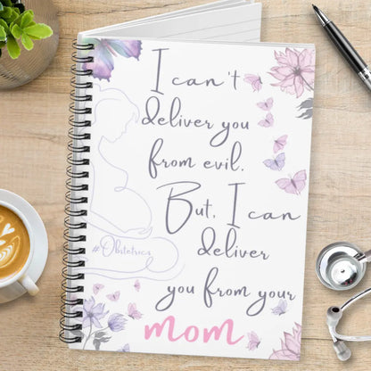 Notebook with a humorous quote 'I Can't Deliver You From Evil But I Can Deliver You From Your Mom' on a wooden surface with a stethoscope.