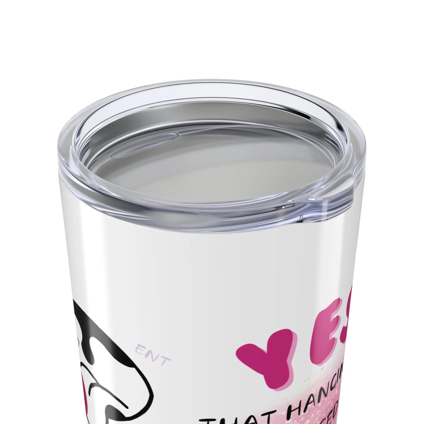 Clear lid on tumbler with pink text and design on a white background