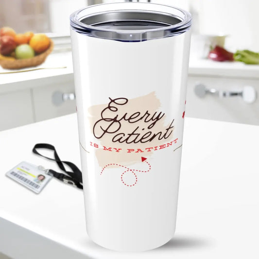 White tumbler with 'Every Patient is My Patient' text on a kitchen counter.