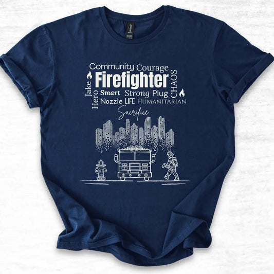 Navy blue t-shirt with white firefighter-themed graphics and text on a light gray background