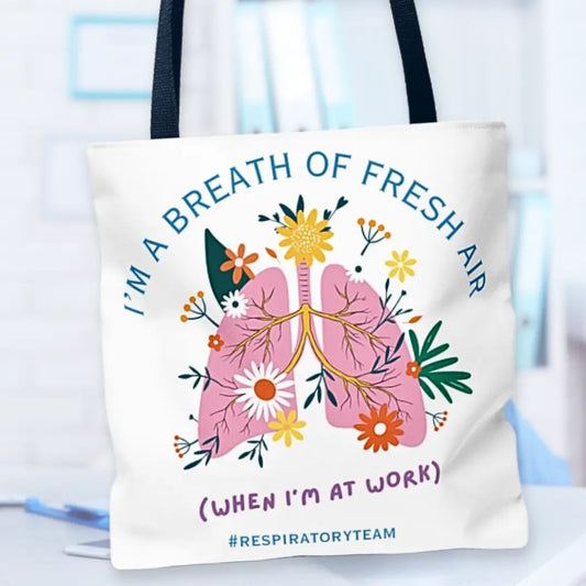 Tote bag with lungs and flowers design and "Respiratory Team" logo on a blurred background