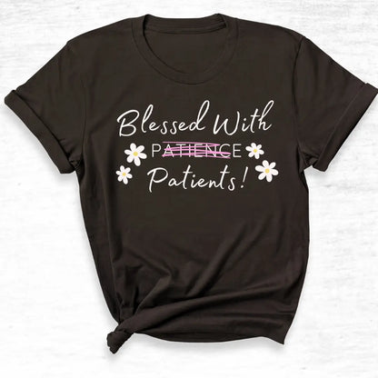 Black t-shirt with 'Blessed With Patients Not Patients!' text and flowers on a white background