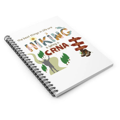Notebook with hiking and CRNA-themed design on a white background