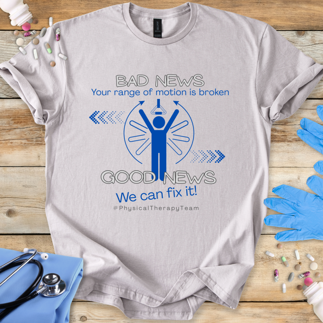 Gray t-shirt with a physical therapy-themed graphic and 'Your range of motion is broken' on a wooden surface with gloves and tools.