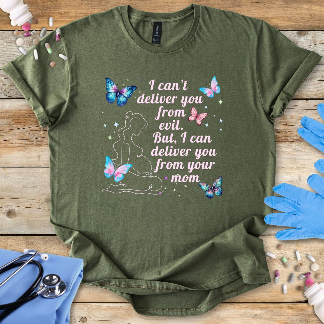 Green t-shirt with a graphic and text on a wooden surface with medical supplies.