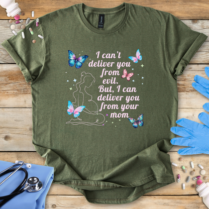 Green t-shirt with a graphic and text on a wooden surface with medical supplies.