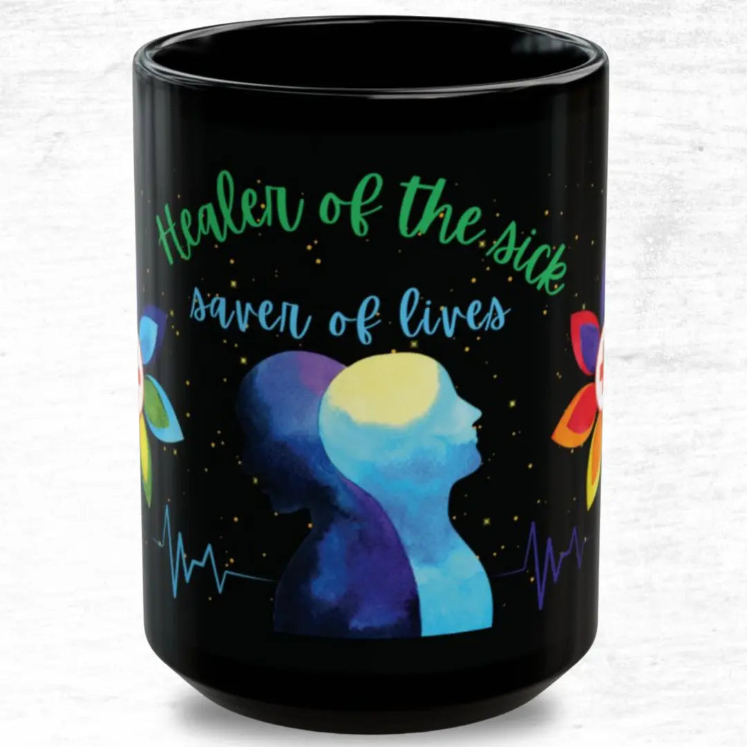 Black mug with colorful design and text 'Healer of the sick, saver of lives' on a white background