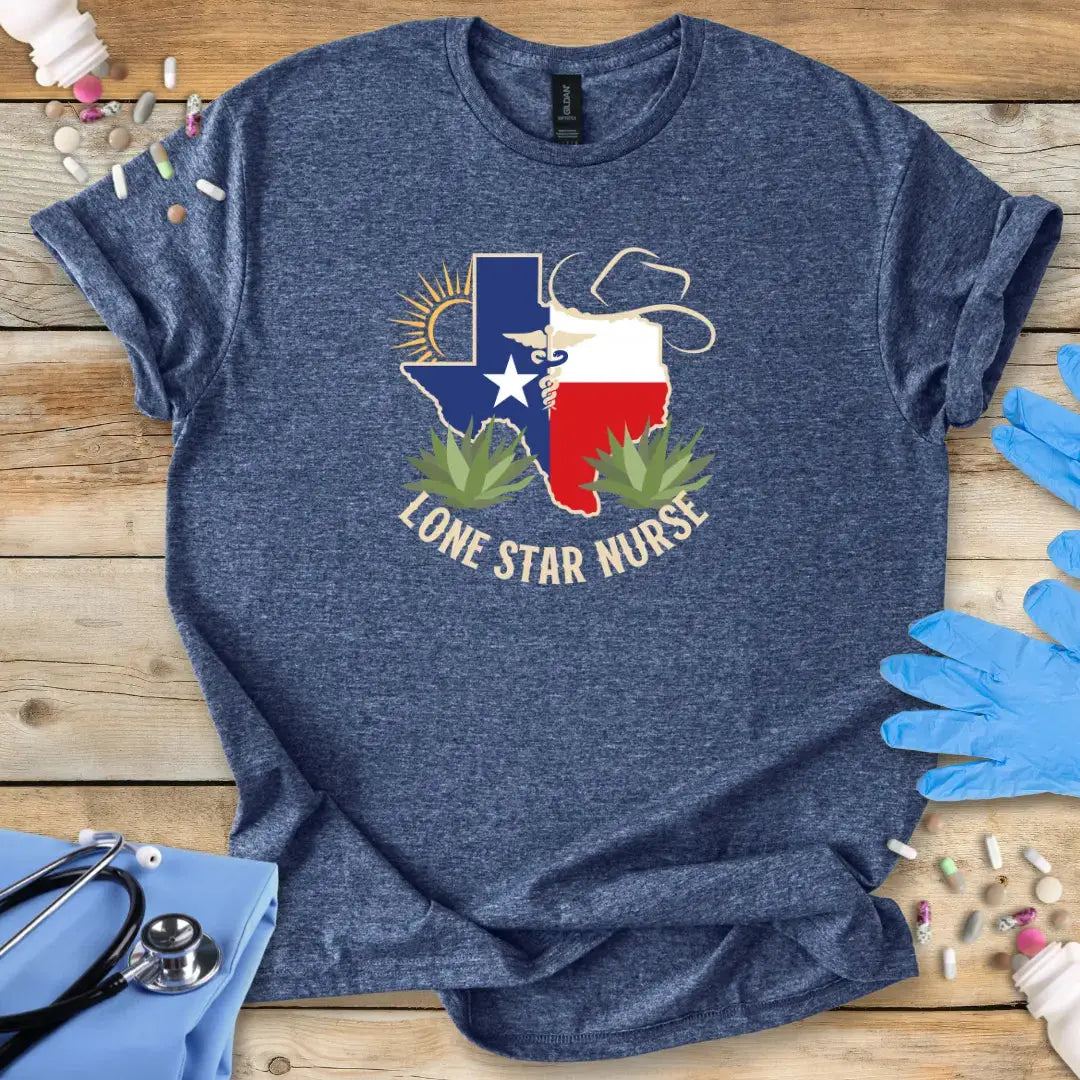 Blue t-shirt with 'Lone Star Nurse' design on a wooden surface with medical supplies.