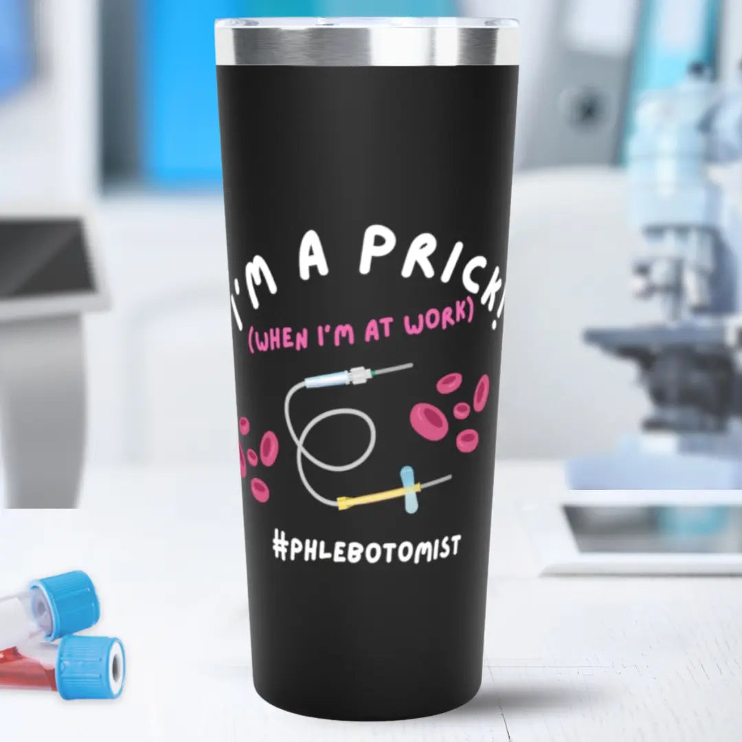 Black stainless steel tumbler with 'I'm A Prick When I'm At Work' text and graphics on a blurred background