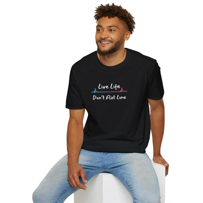 Man wearing a black t-shirt with 'Live Life Don't Flat Line' text sitting on a white stool with a white background.