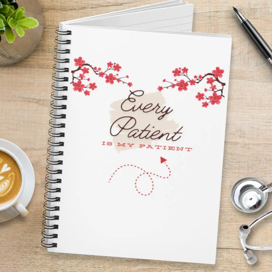 Notebook with 'Every Patient is My Patient' text on a wooden surface with a cup of coffee and stethoscope.