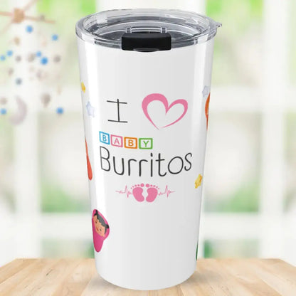 White stainless steel tumbler with 'I ♥ Baby Burritos' text featuring colorful block-letter 'BABY' and pink baby footprint heartbeat design, surrounded by diverse swaddled newborn illustrations, on a blurred nursery background.