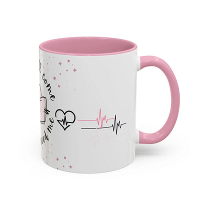 White mug with pink interior and handle featuring a heart design and text on a white background