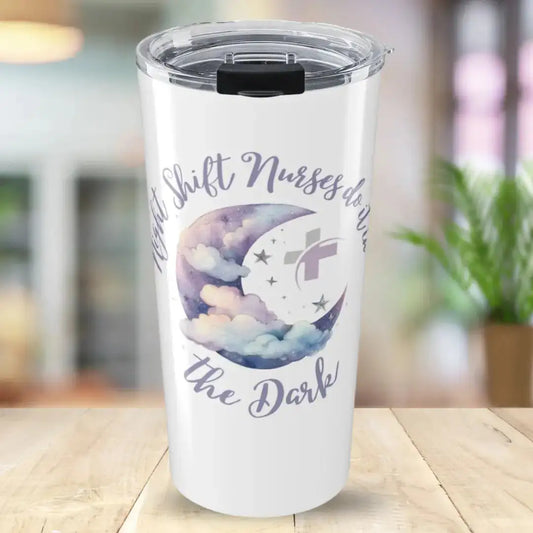 White stainless steel tumbler with 'Night Shift Nurses Do It In The Dark' in purple script, centered around a watercolor crescent moon with soft pastel clouds and silver star accents, on a blurred home background.