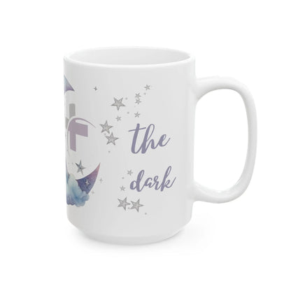 White mug with star and moon designs and 'The Dark' text on a white background