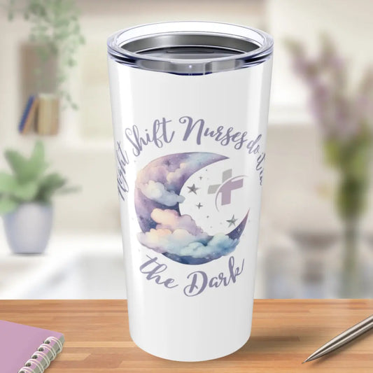 Tumbler with 'Night Shift Nurses Do It In The Dark' text on a wooden surface.