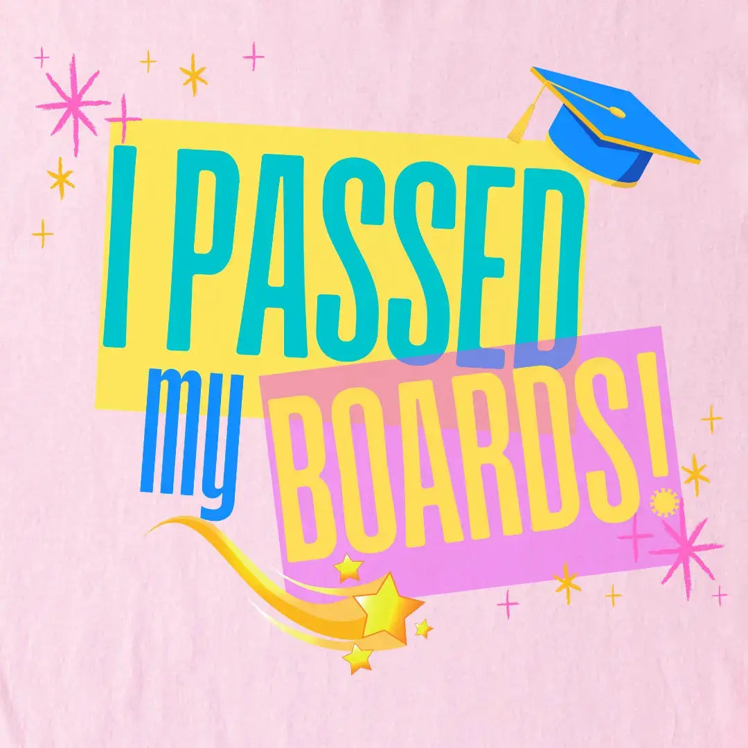 Colorful text 'I Passed My Boards!' with a graduation cap on a pink background