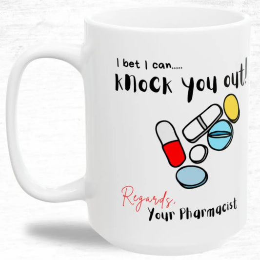 White mug with colorful pills and 'I Bet I Can Knock You Out' text on a white background 
