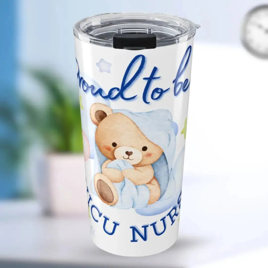 Tumbler with a teddy bear design and text 'Proud-To-Be-A-NICU-Nurse' on a blurred background
