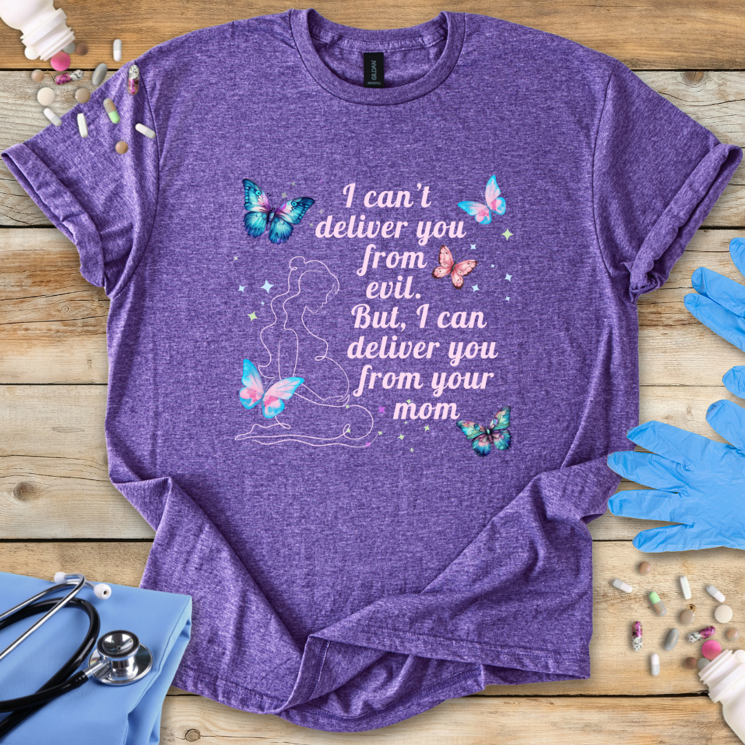 Purple t-shirt with butterfly design and funny labor and delivery text on a wooden surface with medical supplies.