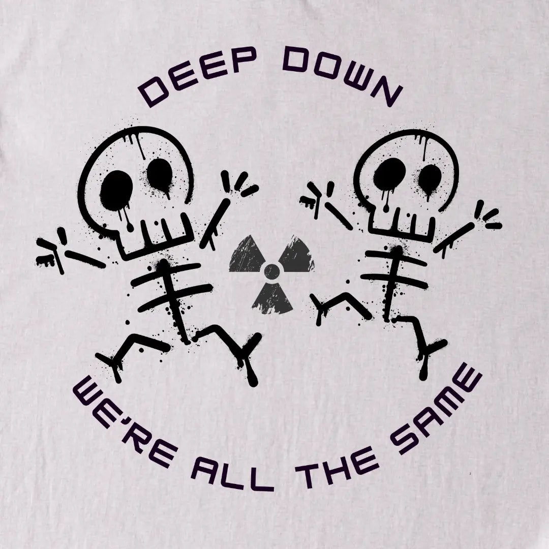 Gray t-shirt with black skeletons original design and text 'Deep Down We're All The Same' on a Gray background.