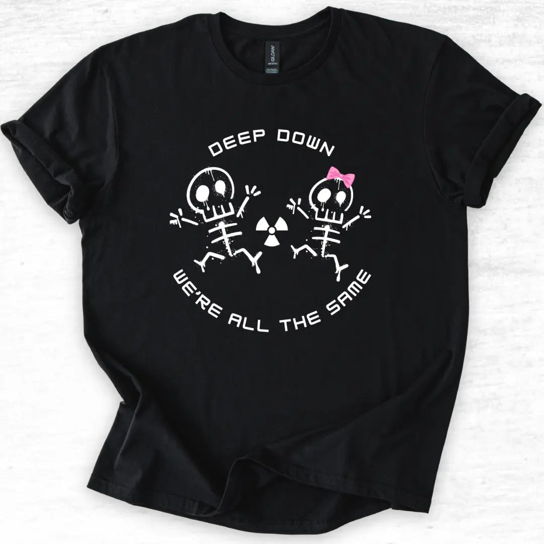 Black t-shirt with skeleton design and 'Deep Down We Are All The Same' text on a light gray background
