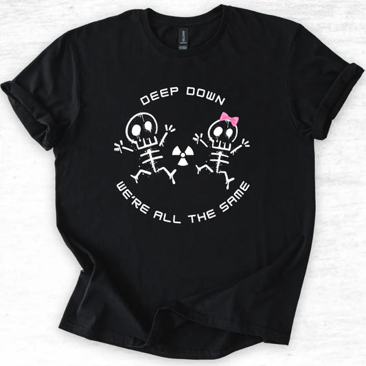 Black t-shirt with skeleton design and 'Deep Down We Are All The Same' text on a light gray background
