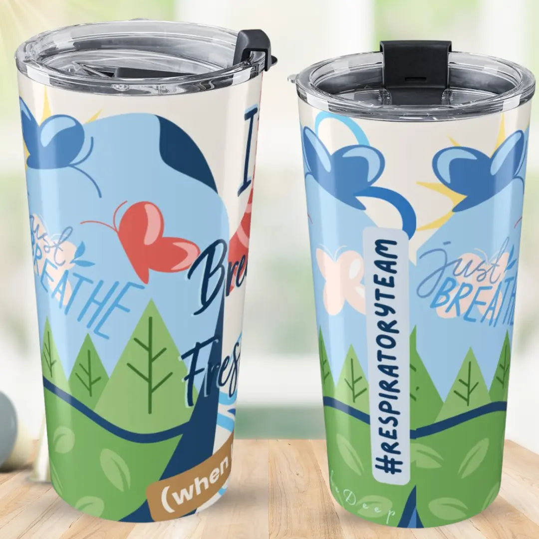Two tumblers with motivational respiratory therapy theme designs on a wooden surface.