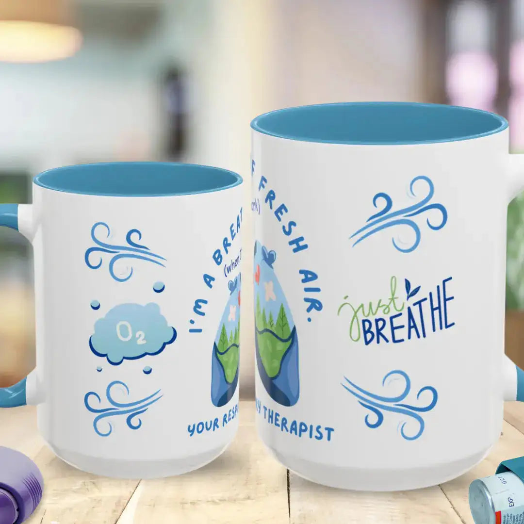 Two mugs with motivational respiratory therapy designs and 'Just Breathe' text on a blurred background