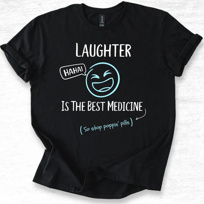 Black funny medical t-shirt with humorous text 'Laughter is the best medicine so stop poppin pills' and original laughing design on a white background.