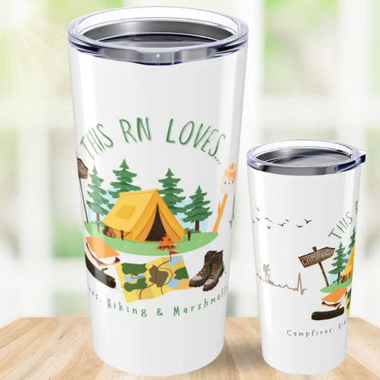 Two tumblers with camping-themed designs and 'This RN Loves Camping' on a wooden surface.